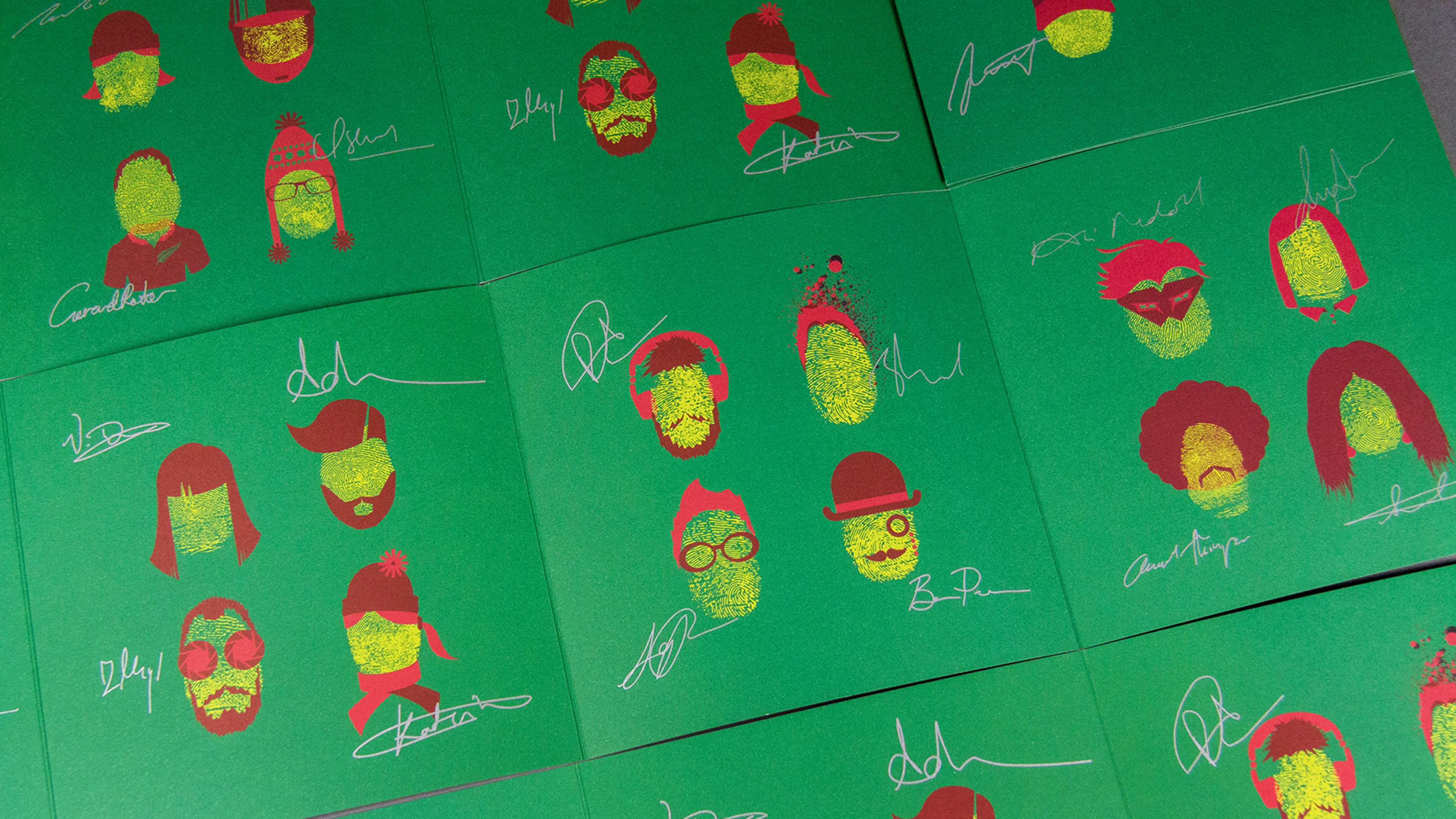 impress-your-clients-with-your-christmas-marketing-01@2x Image of a campaign that used customised finger prints of the team